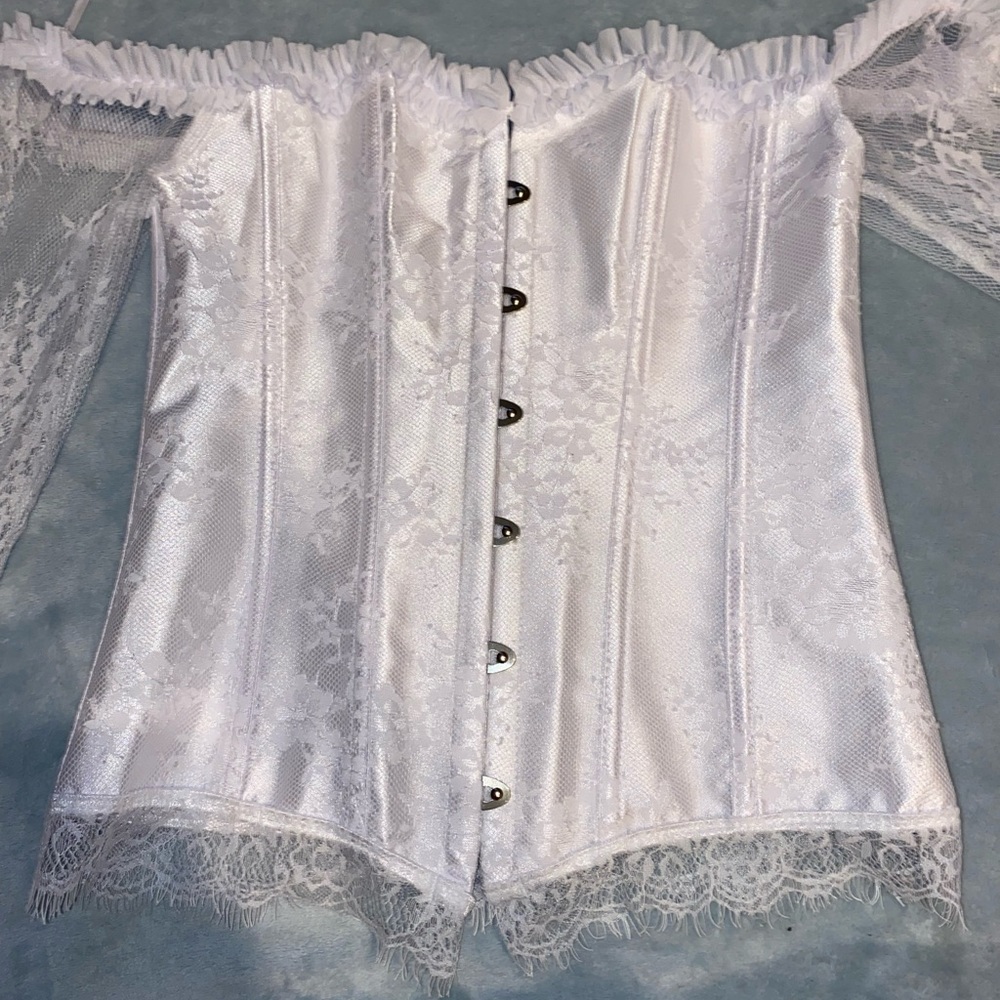 Long sleeve corset that is white size Medium